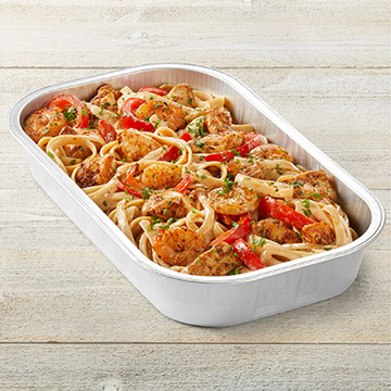 Order Cajun Shrimp & Chicken Pasta Party Tray food online from Tgi Fridays store, Madison on bringmethat.com
