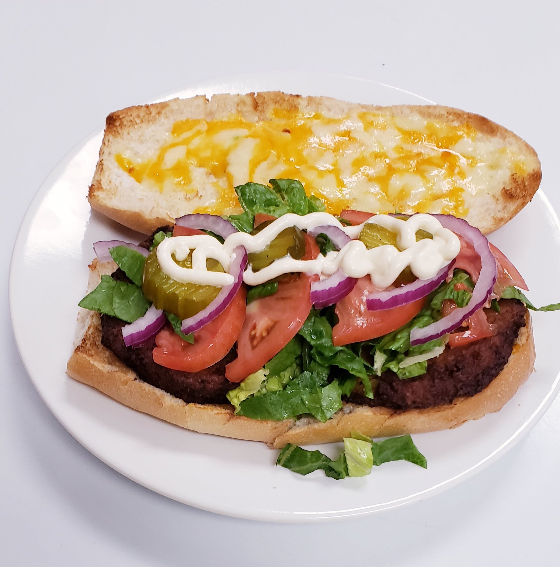 Order Veggie burger. - Panini food online from J-Joe Berrylicious store, White Plains on bringmethat.com