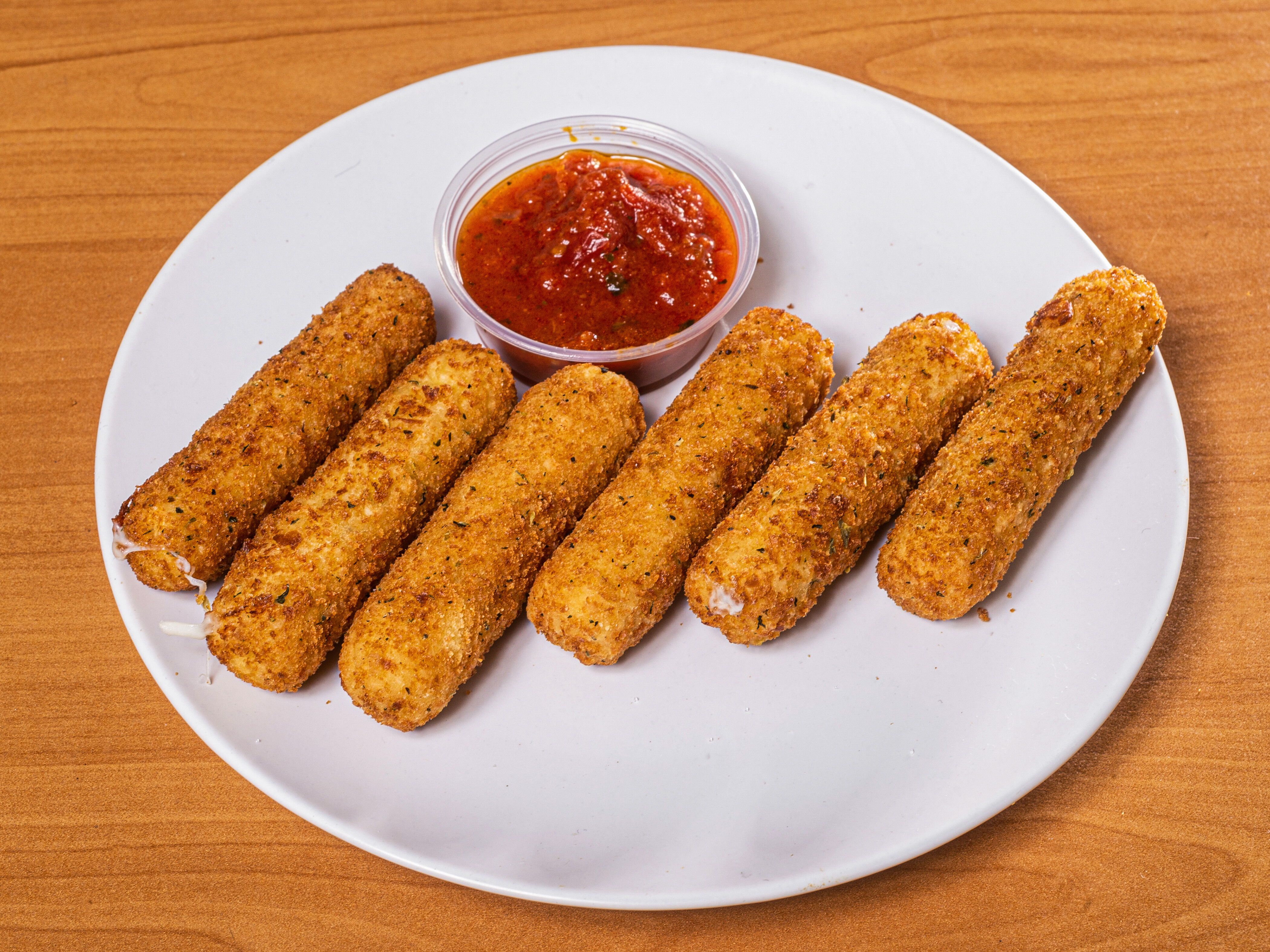 Order Mozzarella Sticks food online from Famous Phillys Cheesesteak store, Clayton on bringmethat.com