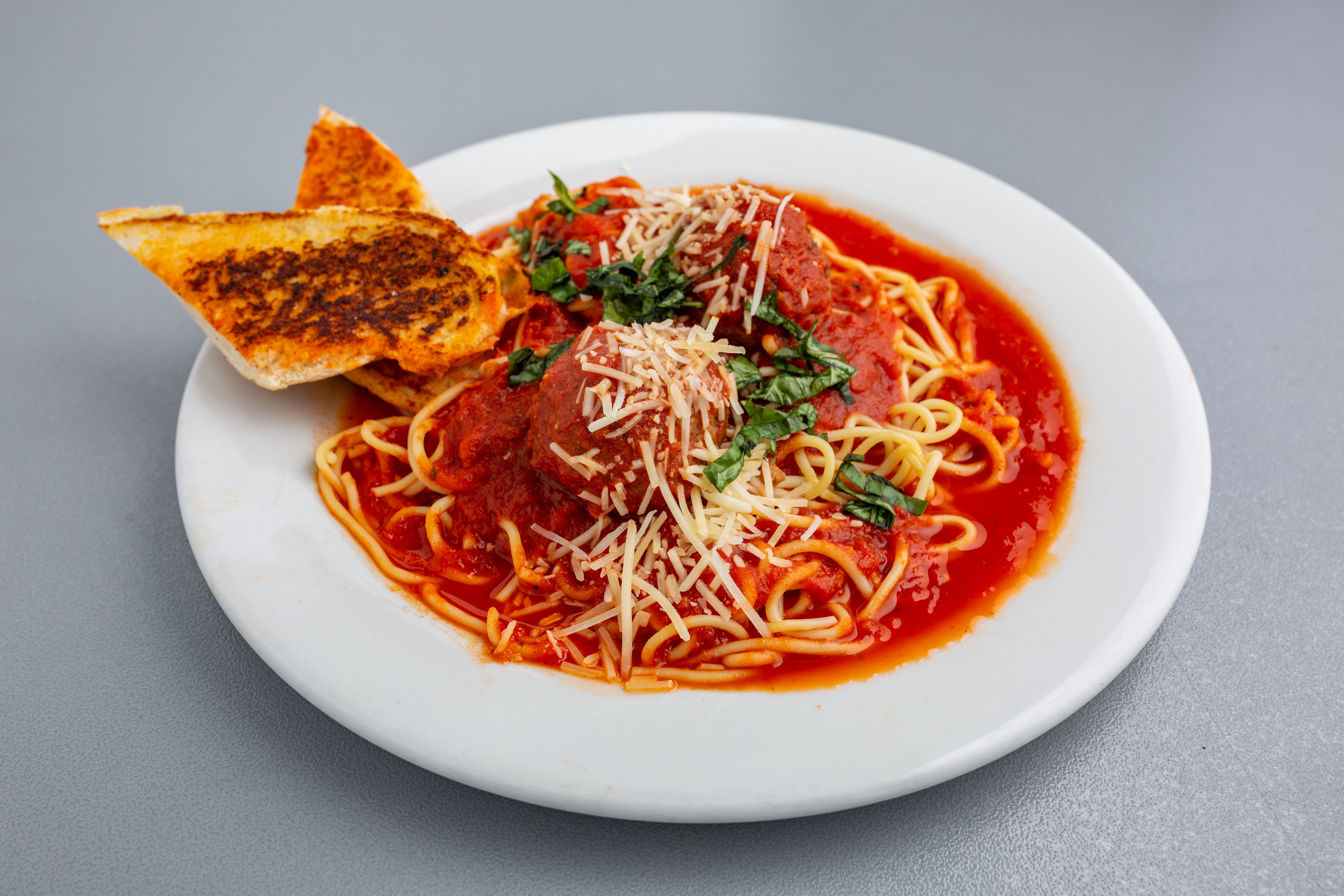 Order Spaghetti with Meatballs - Pasta food online from Napoli Pizza store, Henderson on bringmethat.com