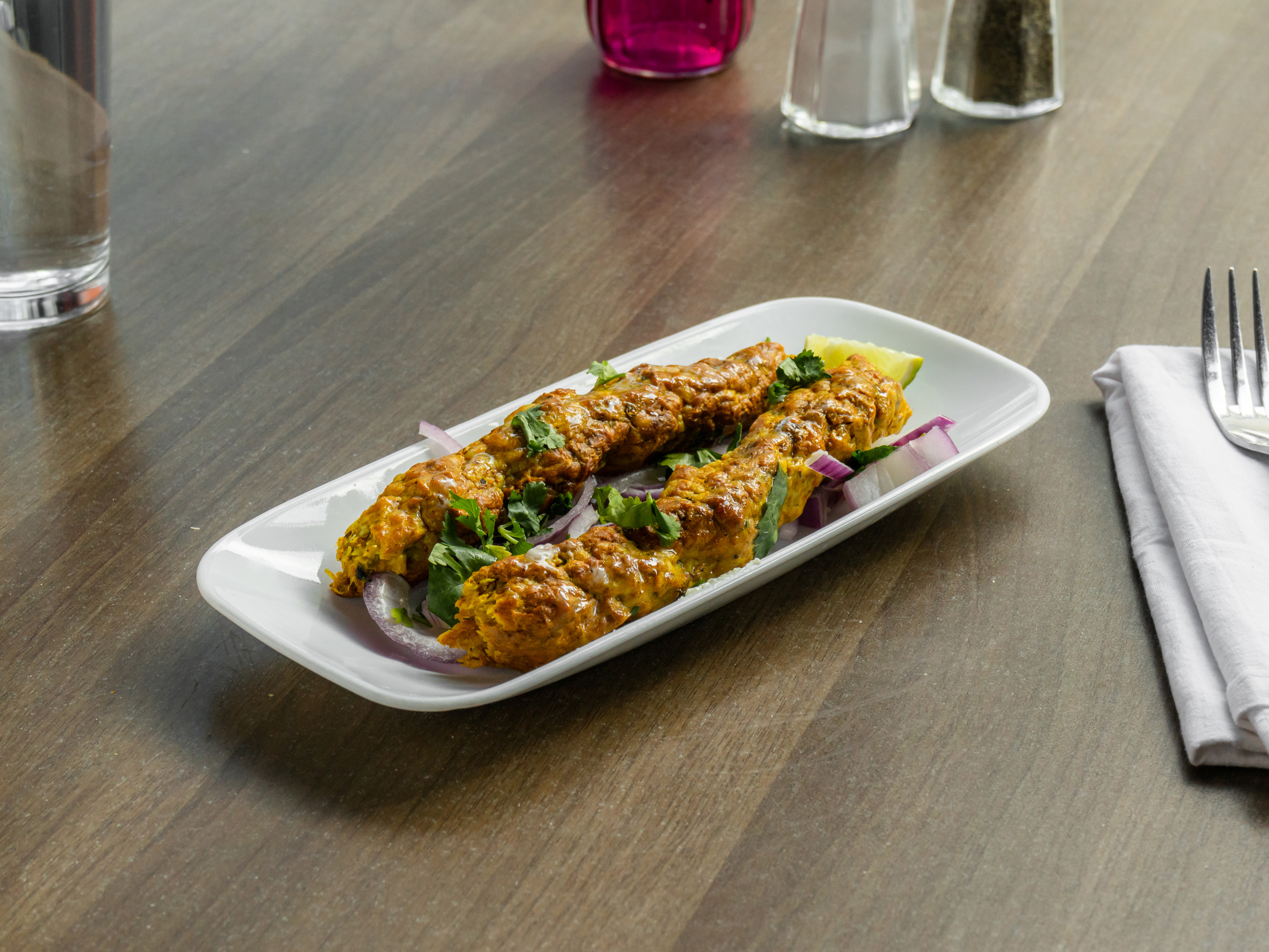 Order Spiced Ground Lamb Seekh Kabab food online from Zaika India Cuisine store, San Francisco on bringmethat.com