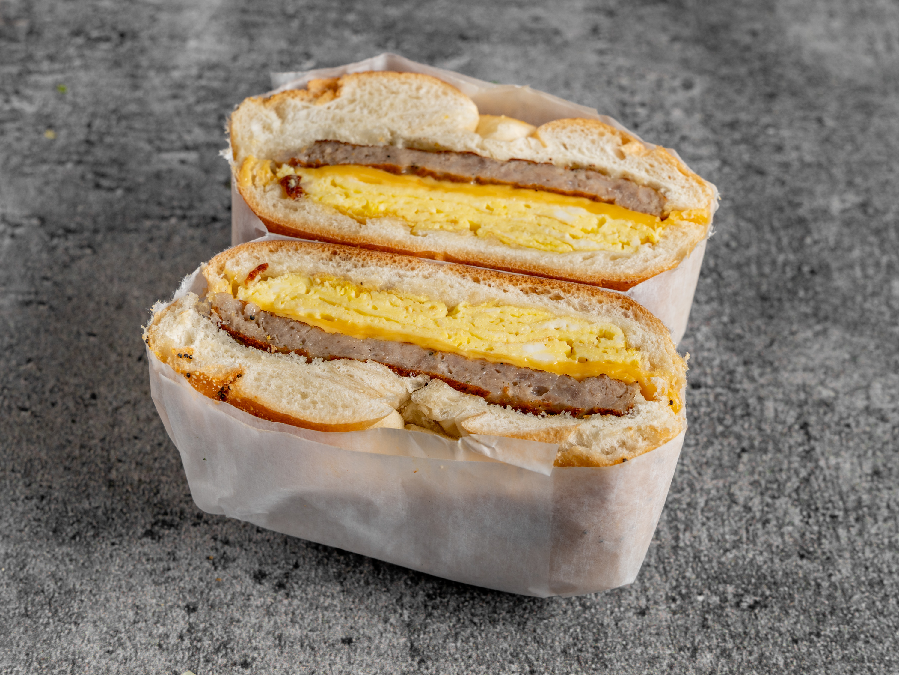 Order B3. Two Eggs on Roll With Sausage food online from Meadow Deli store, East Meadow on bringmethat.com