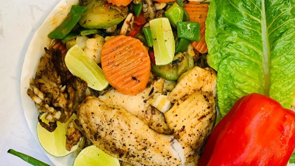 Order Tilapia Dish with Vegetables food online from NY Famous Deli store, Bronx on bringmethat.com