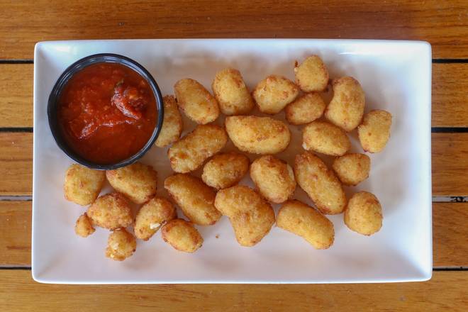 Order Breaded Wisconsin Cheese Curds  food online from Tommy Tavern + Tap store, Bridgewater Township on bringmethat.com