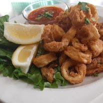 Order Fried Calamari - Appetizer food online from Noli's Restaurant store, Winsted on bringmethat.com