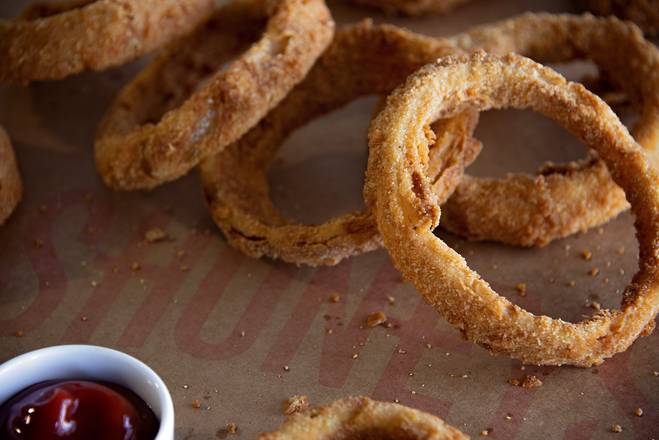 Order Hand-Breaded Onion Rings (5 pcs) food online from Shoney's Restaurant store, Dothan on bringmethat.com