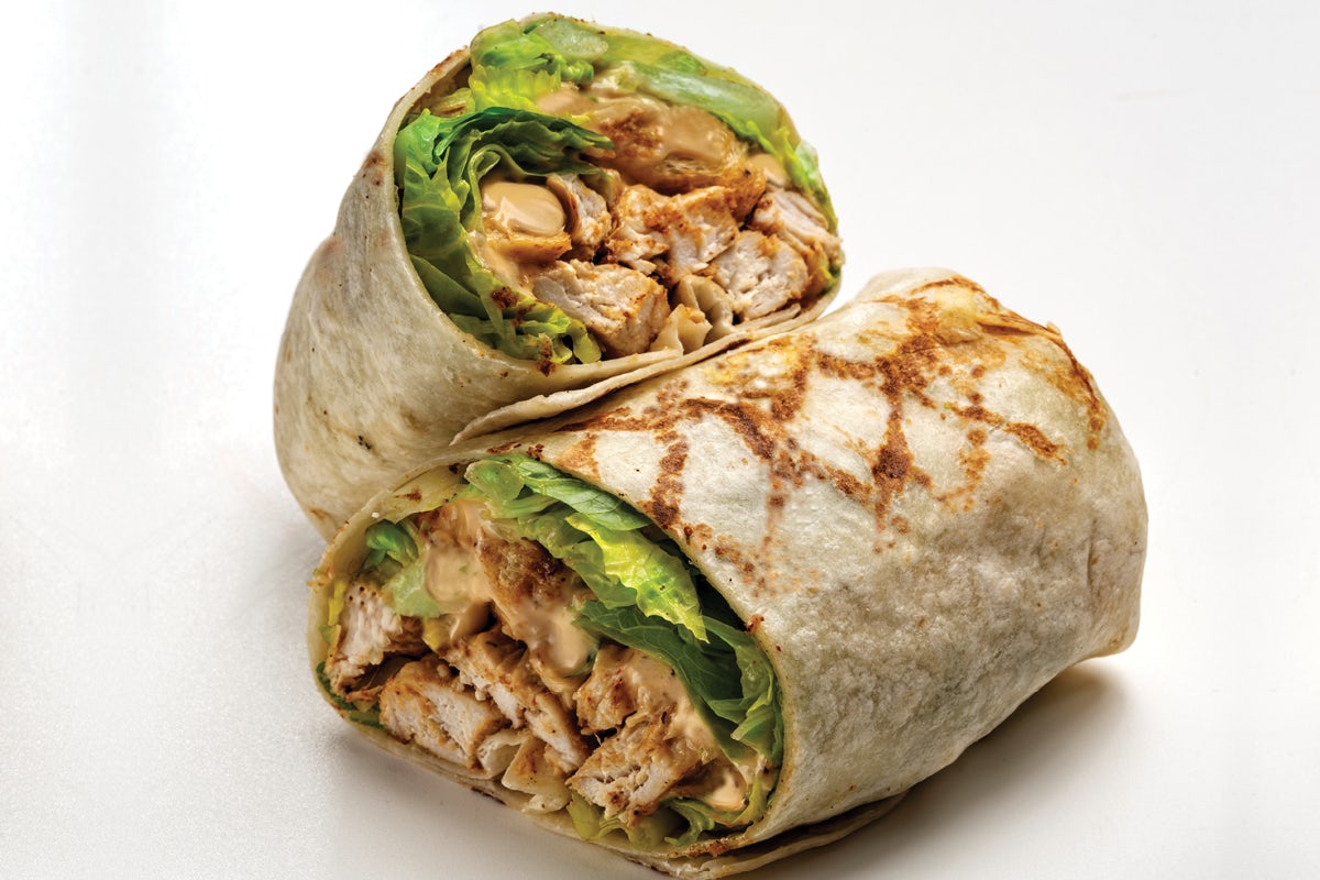 Order Sriracha Chicken Caesar Wrap food online from Arooga's Grille House and Sports Bar store, Warwick on bringmethat.com