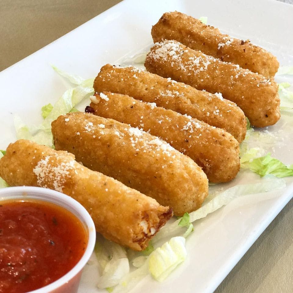 Order Mozzarella Sticks - 6 Pieces food online from Carmelo's Pizza, Pasta, Subs & More!! store, Linthicum Heights on bringmethat.com