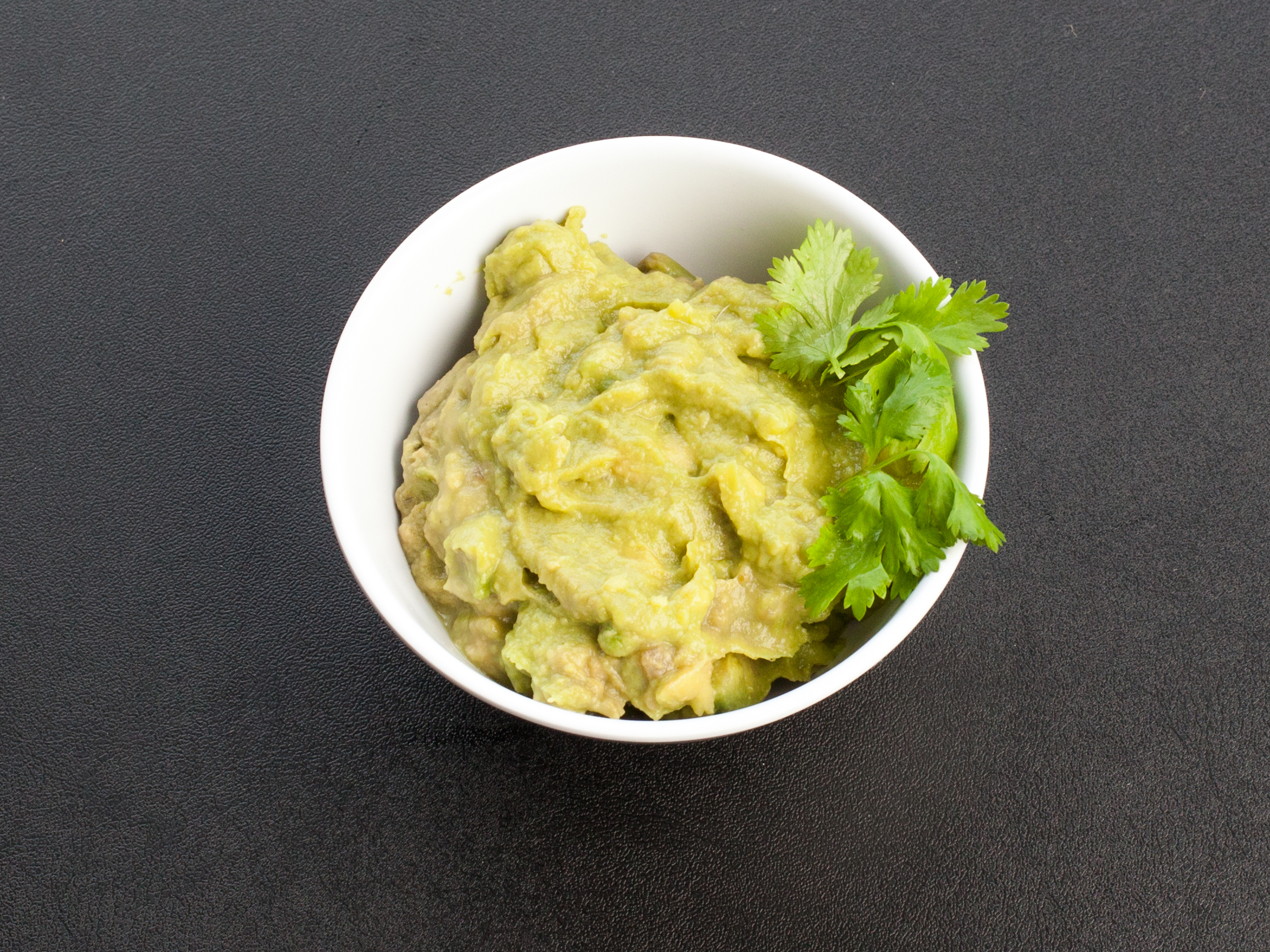 Order Large Guacamole AND CHIPS food online from Tacos Guaymas store, Seattle on bringmethat.com