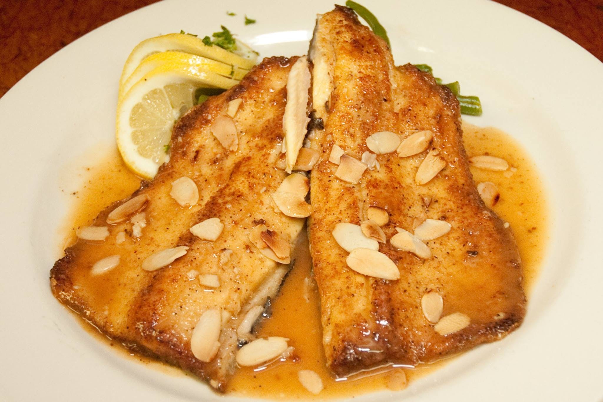 Order Grilled Salmon Fish Special - Entree food online from Pero's store, Atlanta on bringmethat.com