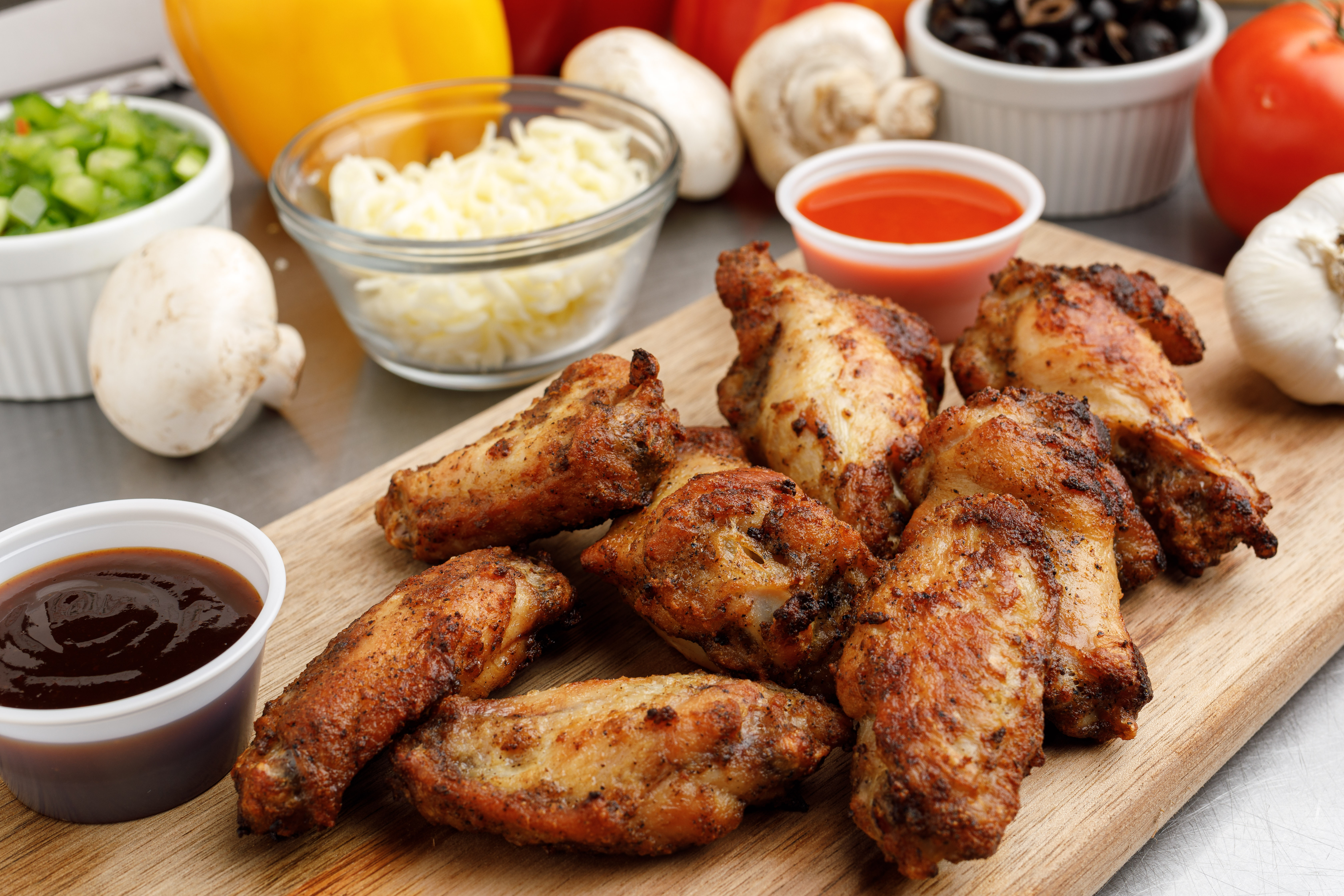 Order 1 lb. Traditional Wings food online from Pizza by the Guy store, Owensboro on bringmethat.com