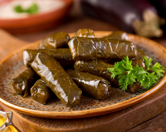 Order Stuffed Grape Leaves food online from The Gyro Spot store, New York on bringmethat.com