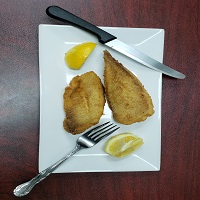 Order Tilpia Fish Cutlet Only food online from Habesha Market and Carry-Out store, Washington on bringmethat.com