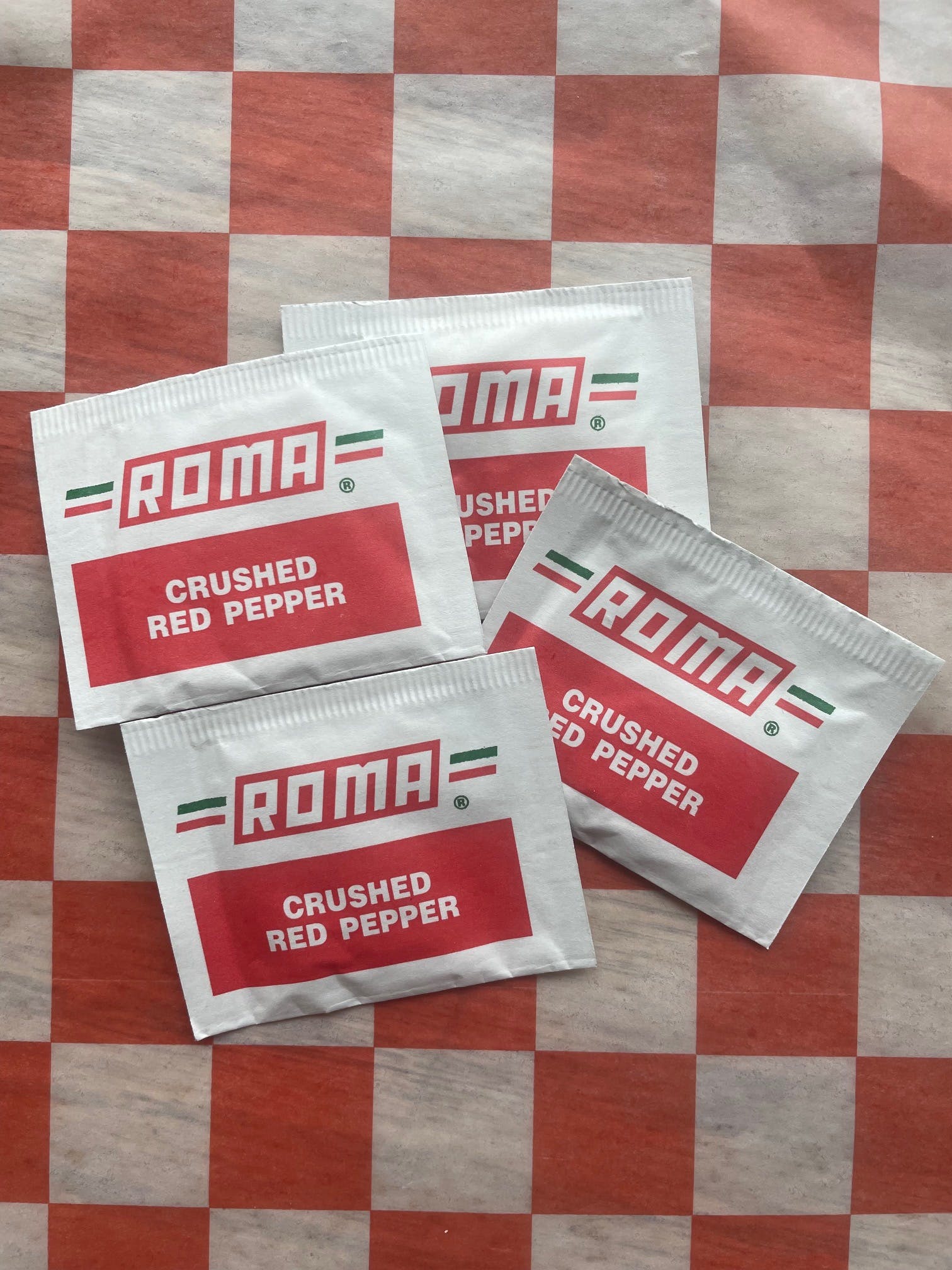 Order Crushed Red Pepper - Four Packets food online from Jimmy's Pizza store, Cold Spring on bringmethat.com