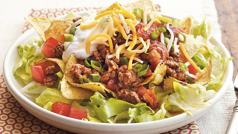 Order Supreme Taco Salad - Salad food online from Fox's Pizza Den store, Parkhill on bringmethat.com
