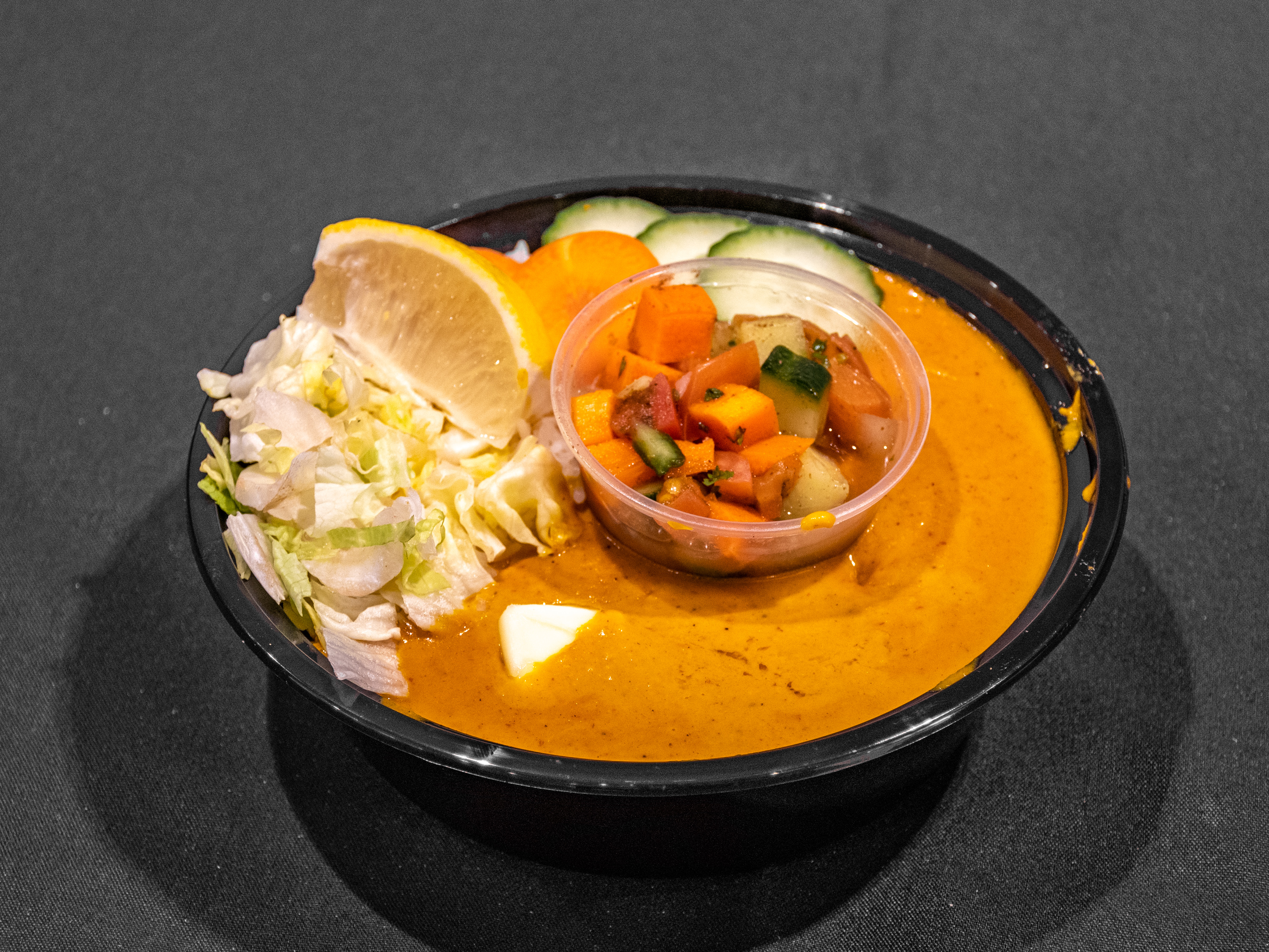 Order Butter chicken rice bowl food online from Turmeric Indian Cuisine store, Salt Lake City on bringmethat.com