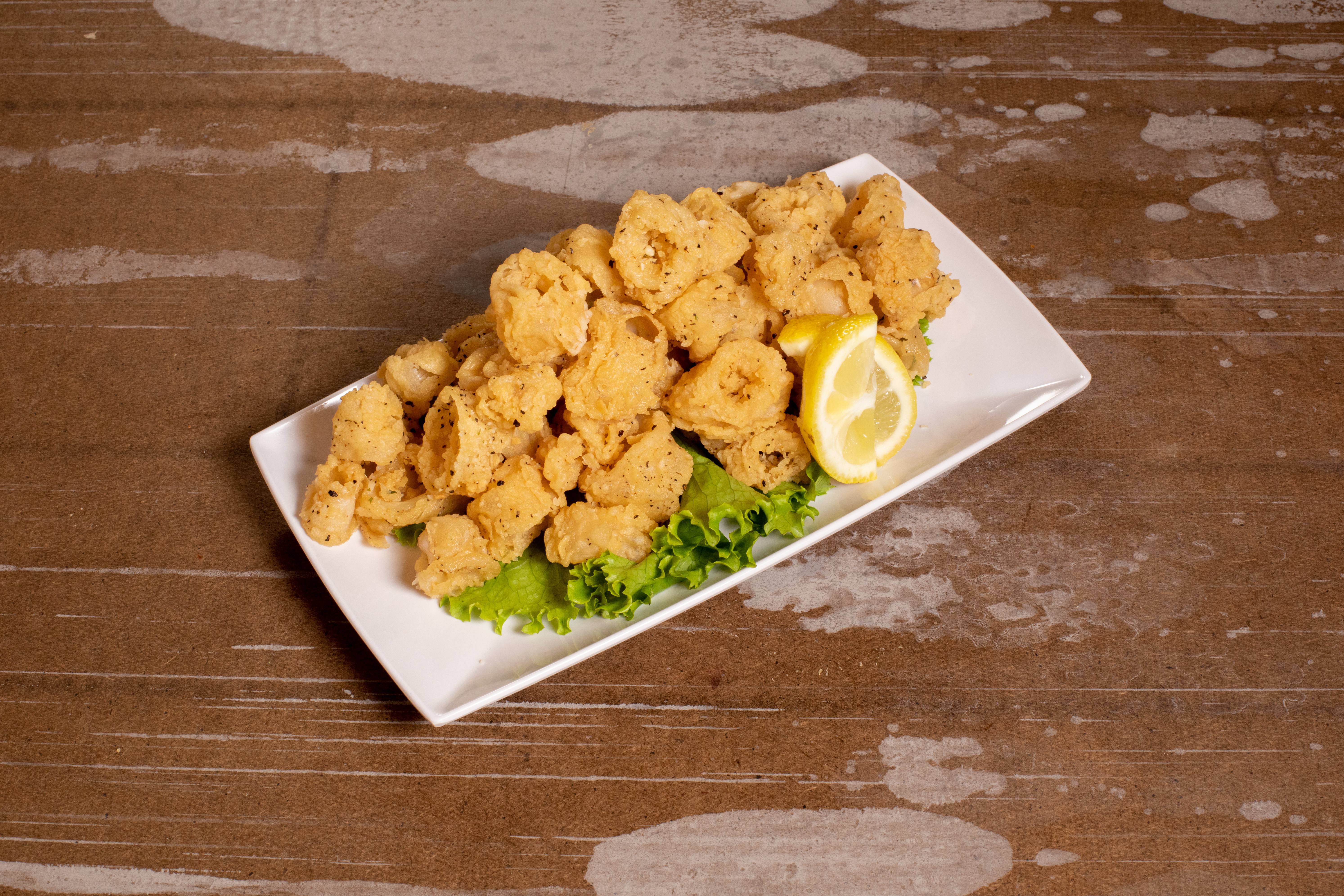 Order Fried Calamari food online from Gallo Nero store, Dallas on bringmethat.com