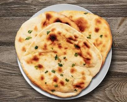 Order Naan food online from Biryani Factory store, Youngstown on bringmethat.com