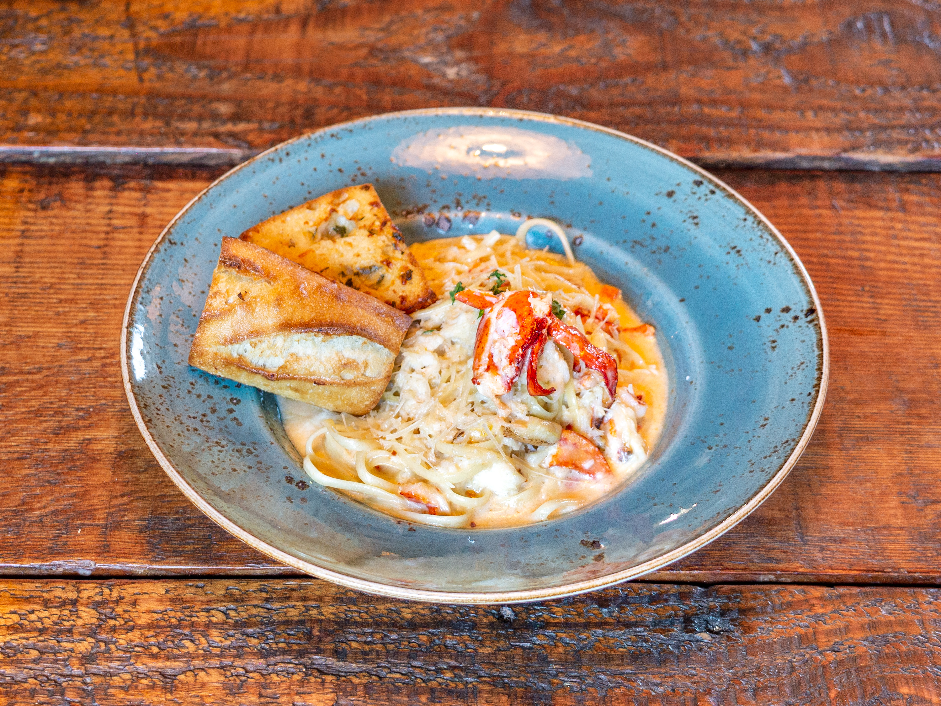 Order Crab & Lobster Linguini food online from Rustic House Oyster Bar and Grill store, San Carlos on bringmethat.com