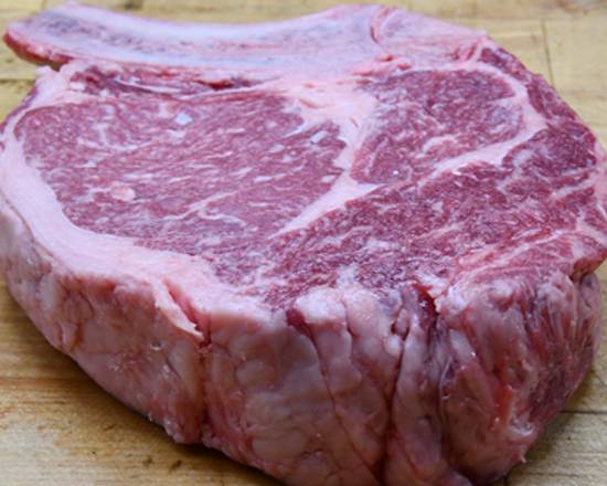 Order 21 oz. Prime "Chicago Cut" Bone-In Ribeye Butcher's Block food online from Morton The Steakhouse store, Naperville on bringmethat.com