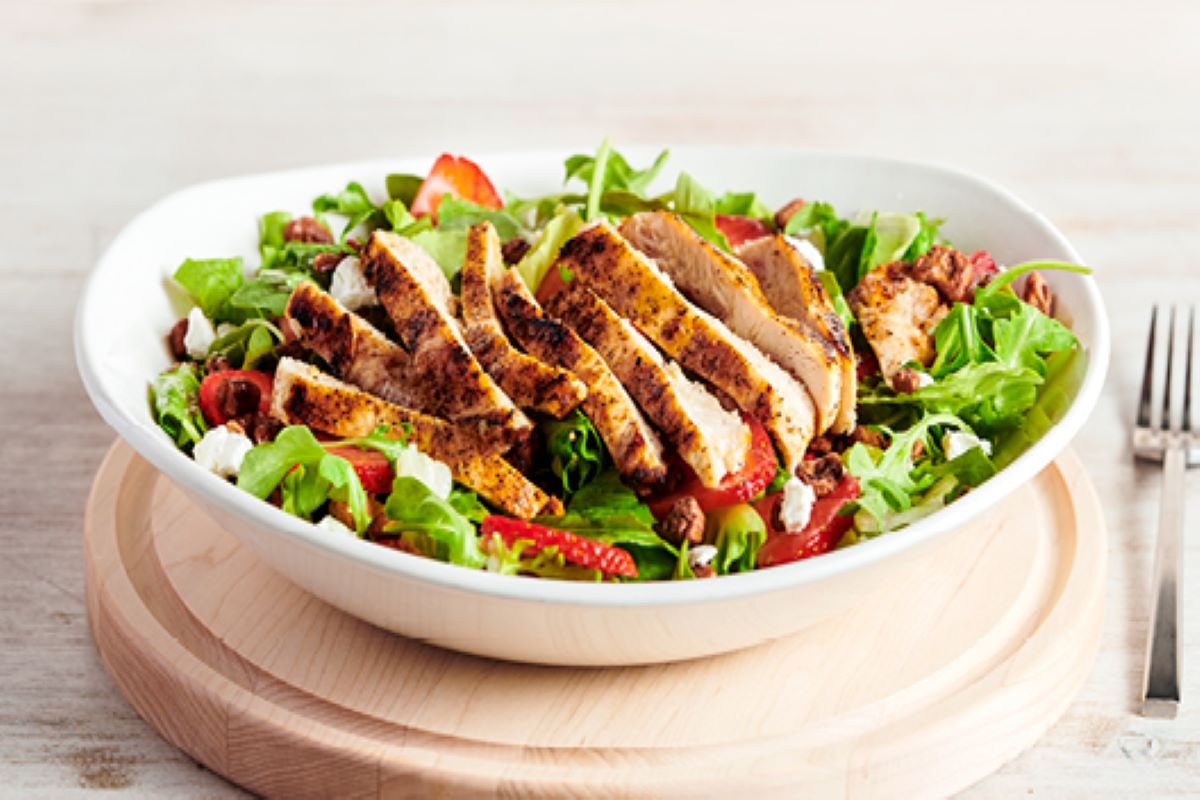 Order New!  Strawberry Salad food online from Outback Steakhouse store, Warner Robins on bringmethat.com