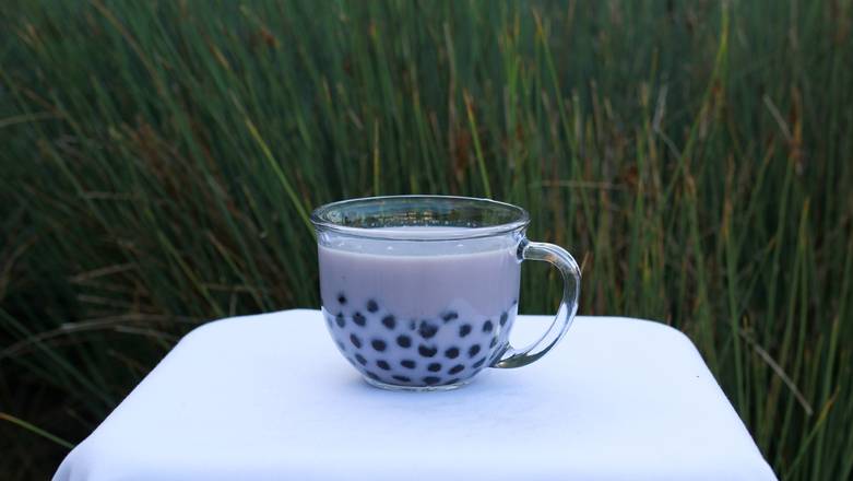 Order Taro Milk Tea, Hot (Medium) food online from Cha For Tea store, Long Beach on bringmethat.com