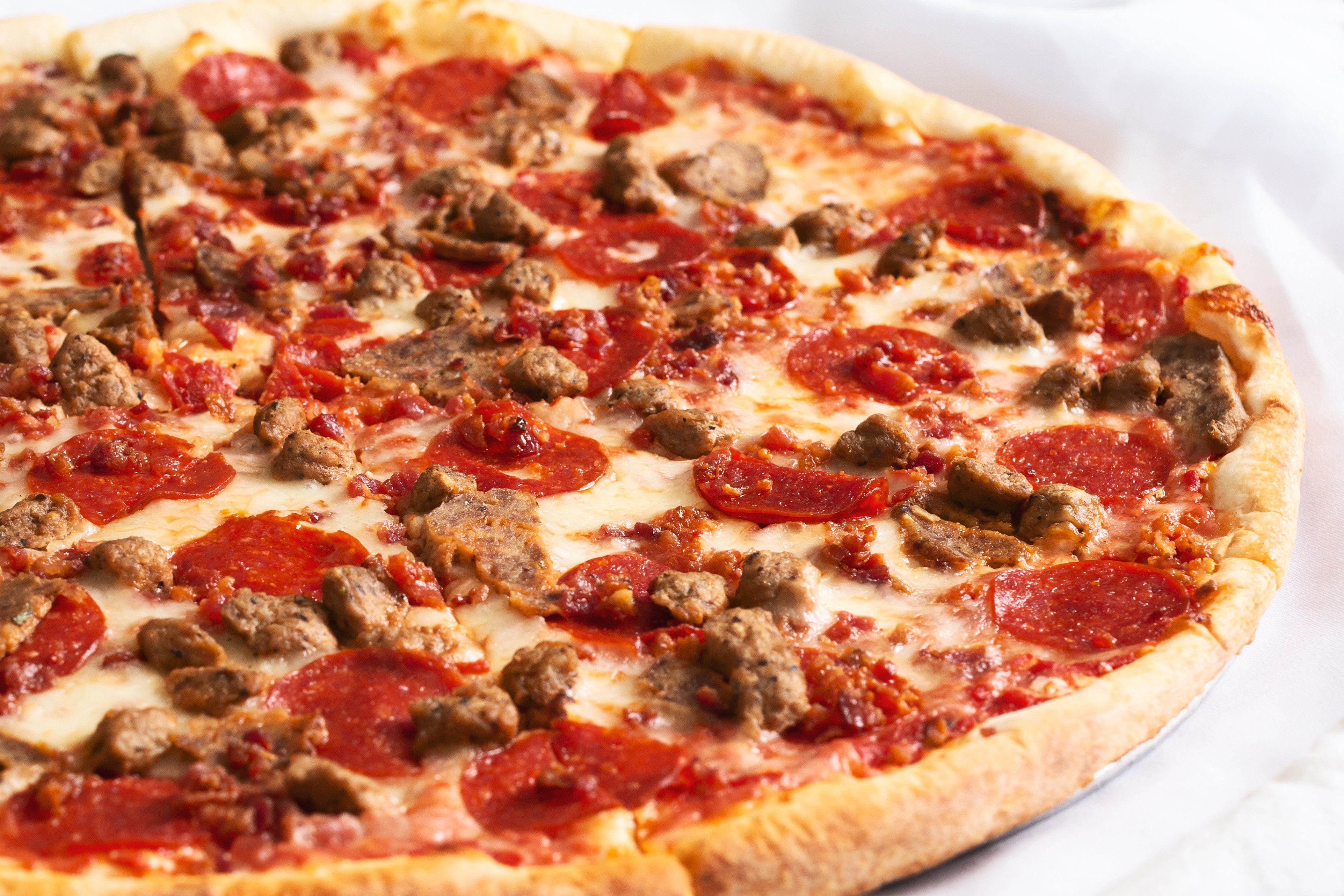 Order Meat Lovers food online from Cafe49 Halal Pizzeria store, Charlotte on bringmethat.com