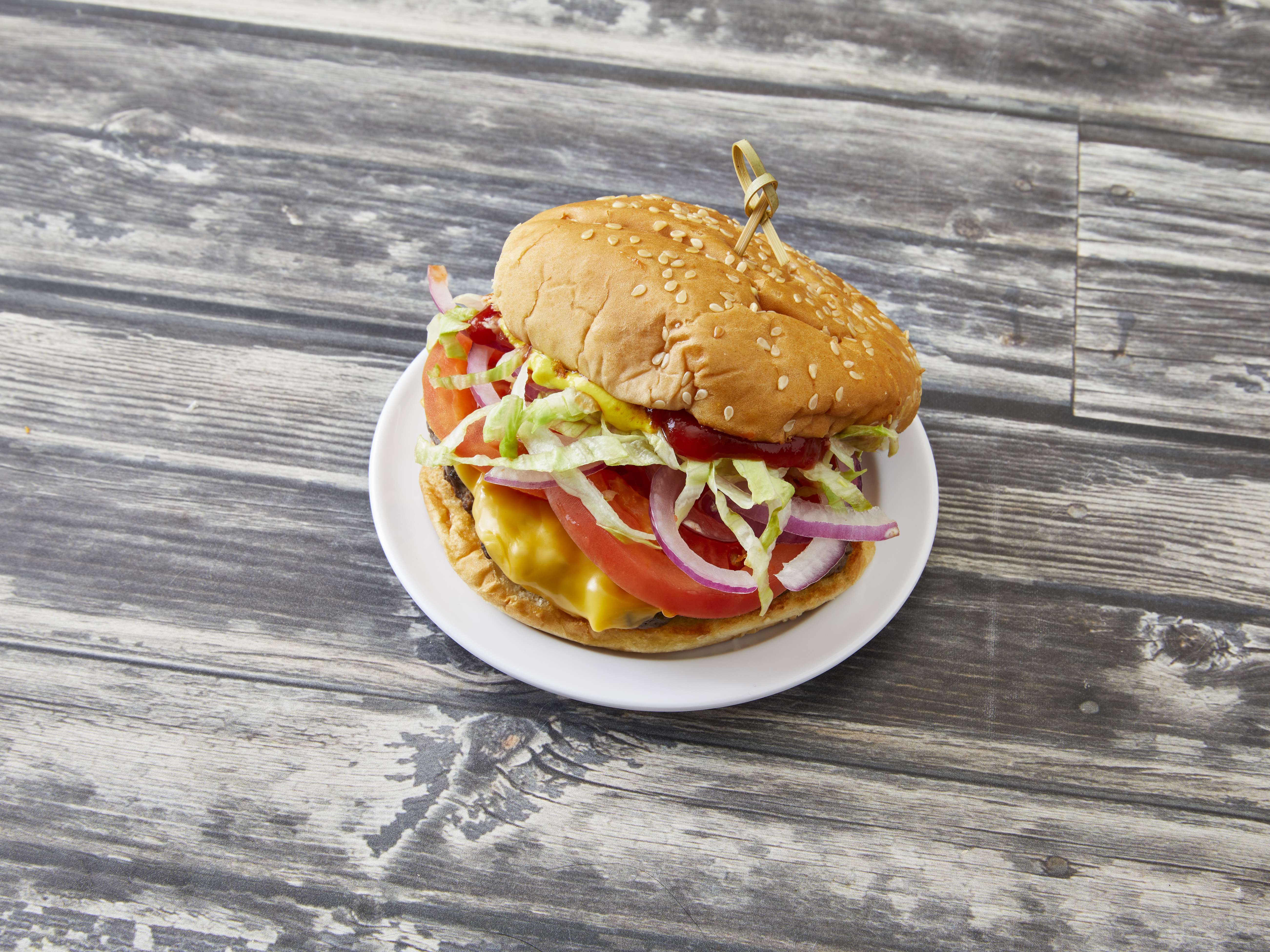 Order Cheeseburger food online from Manhattan Deli 2 store, Southfield on bringmethat.com