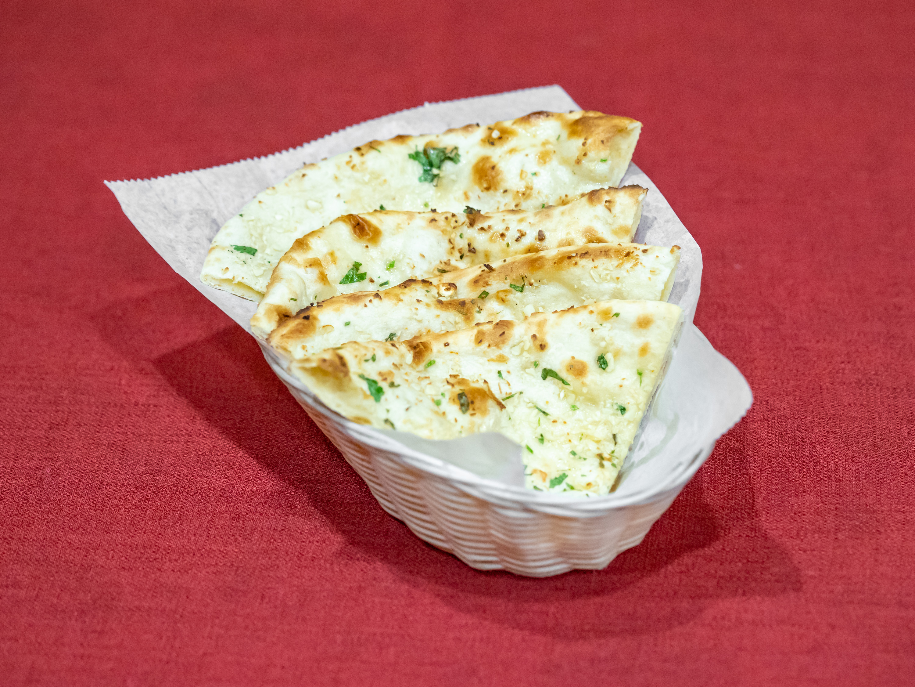 Order Garlic Naan food online from Little India store, Saratoga Springs on bringmethat.com