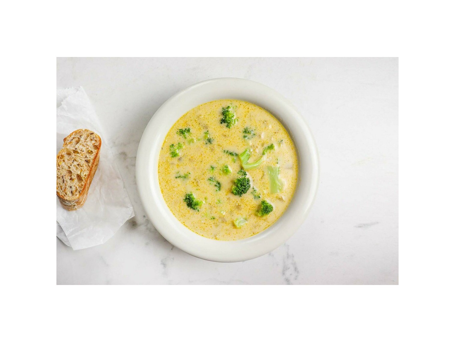 Order Cheddar Broccoli Soup (Bowl) food online from Buona store, Oak Park on bringmethat.com