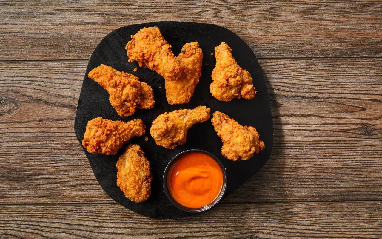 Order Breaded Wings - 8 Pieces food online from Fox Pizza Den store, Aliquippa on bringmethat.com