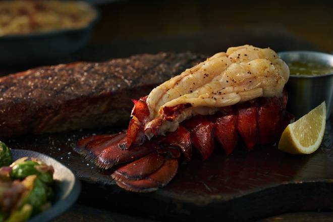 Order Twin Cold-Water Atlantic Lobster Tails food online from Black Angus Steakhouse store, Whittier on bringmethat.com