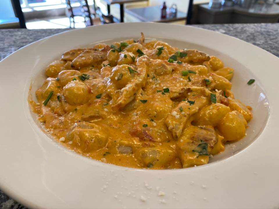 Order CHICKEN GNOCCHI WITH PINK SAUCE food online from Meeting Street Cafe store, Providence on bringmethat.com