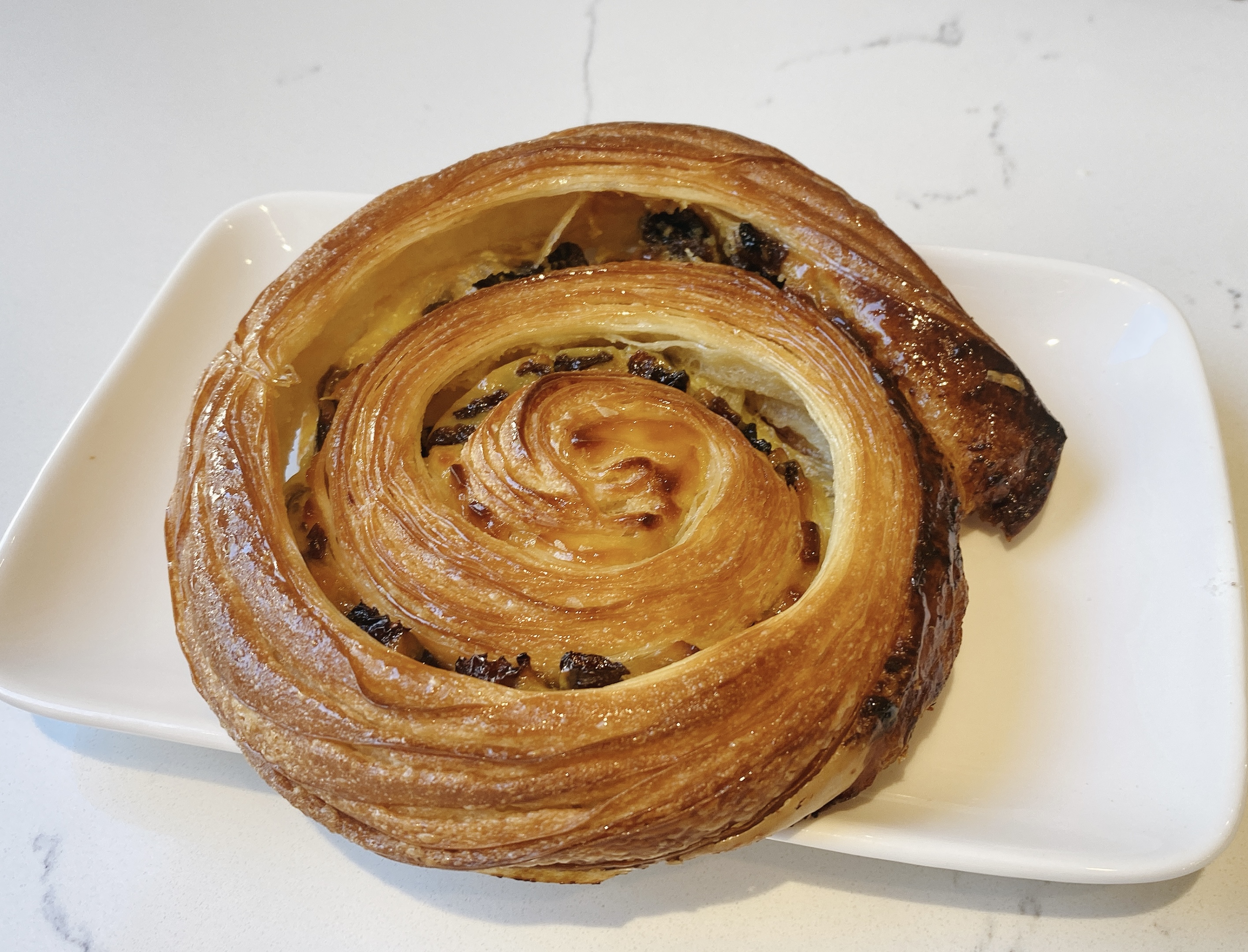 Order Pain Aux Raisin food online from Alexander Patisserie store, Mountain View on bringmethat.com