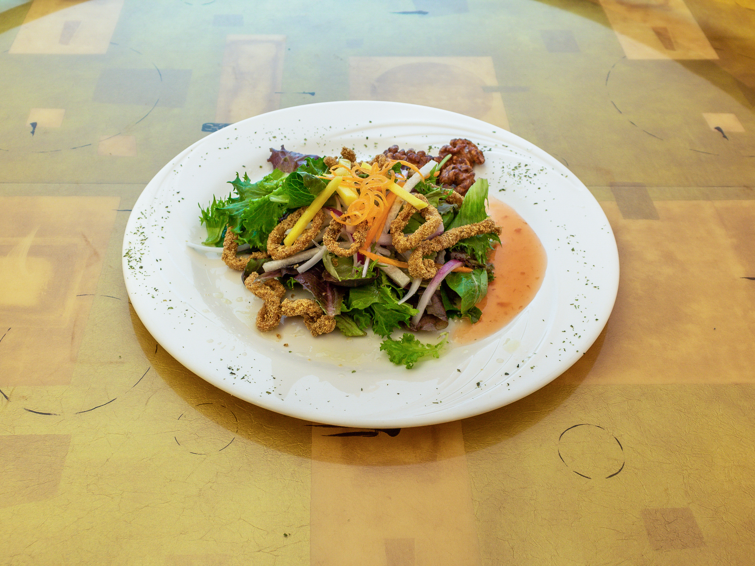 Order Crispy Calamari Salad food online from Concerto Fusion Cuisine store, Morrisville on bringmethat.com