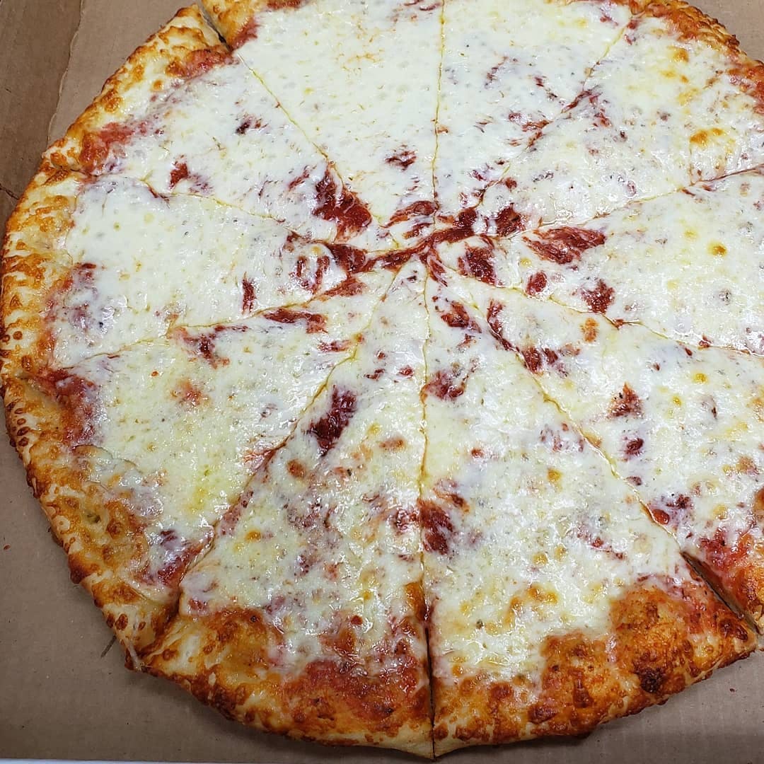 Order Round Cheese Pizza - Small (6 Pieces) food online from Zino's Subs Pizza & Catering store, Livonia on bringmethat.com