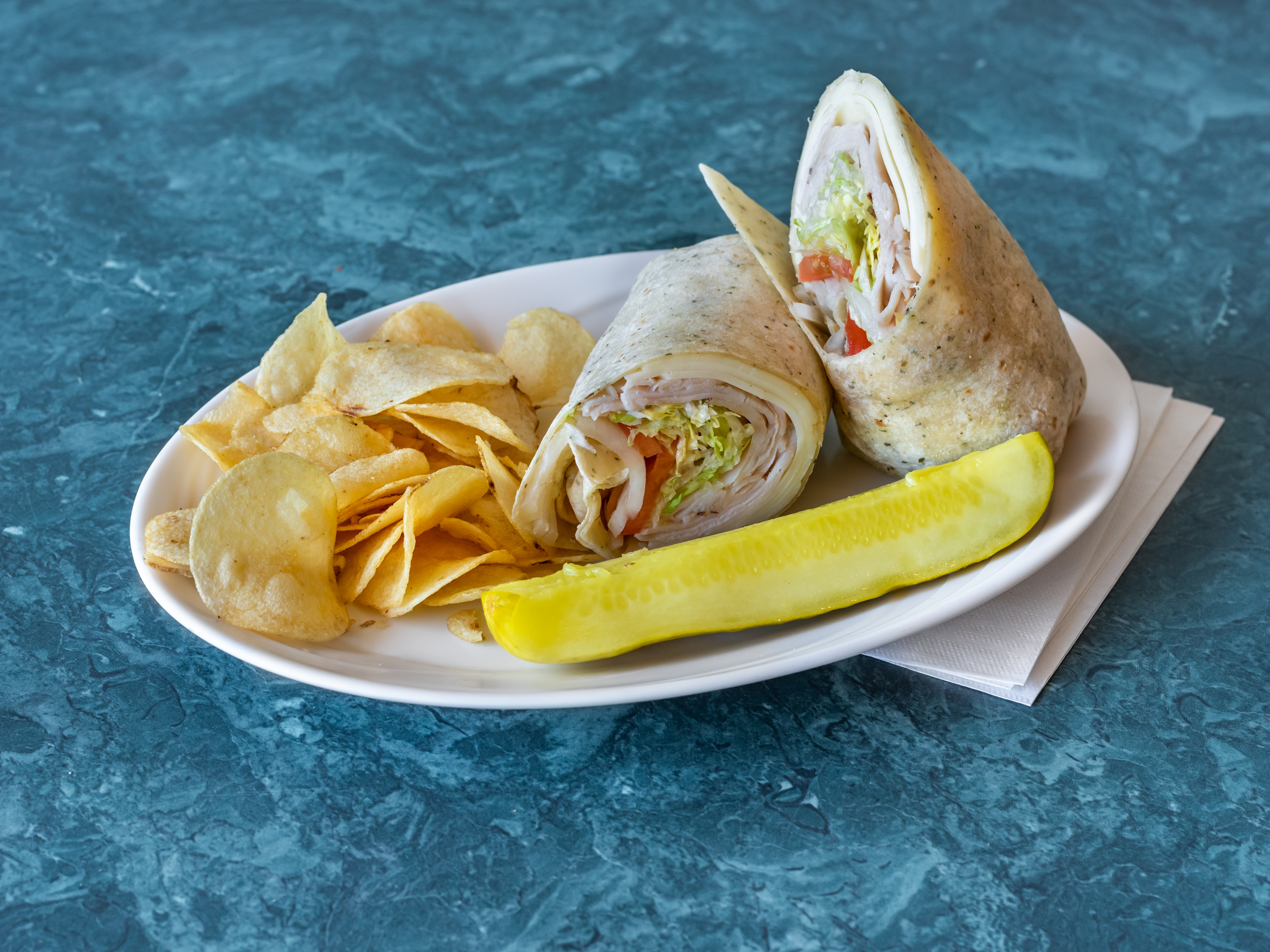 Order Turkey and Swiss Wrap food online from Guidos Pizza store, Eatontown on bringmethat.com