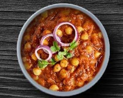 Order Chickpea Masala food online from Tick-Tock Tikka House store, Cary on bringmethat.com