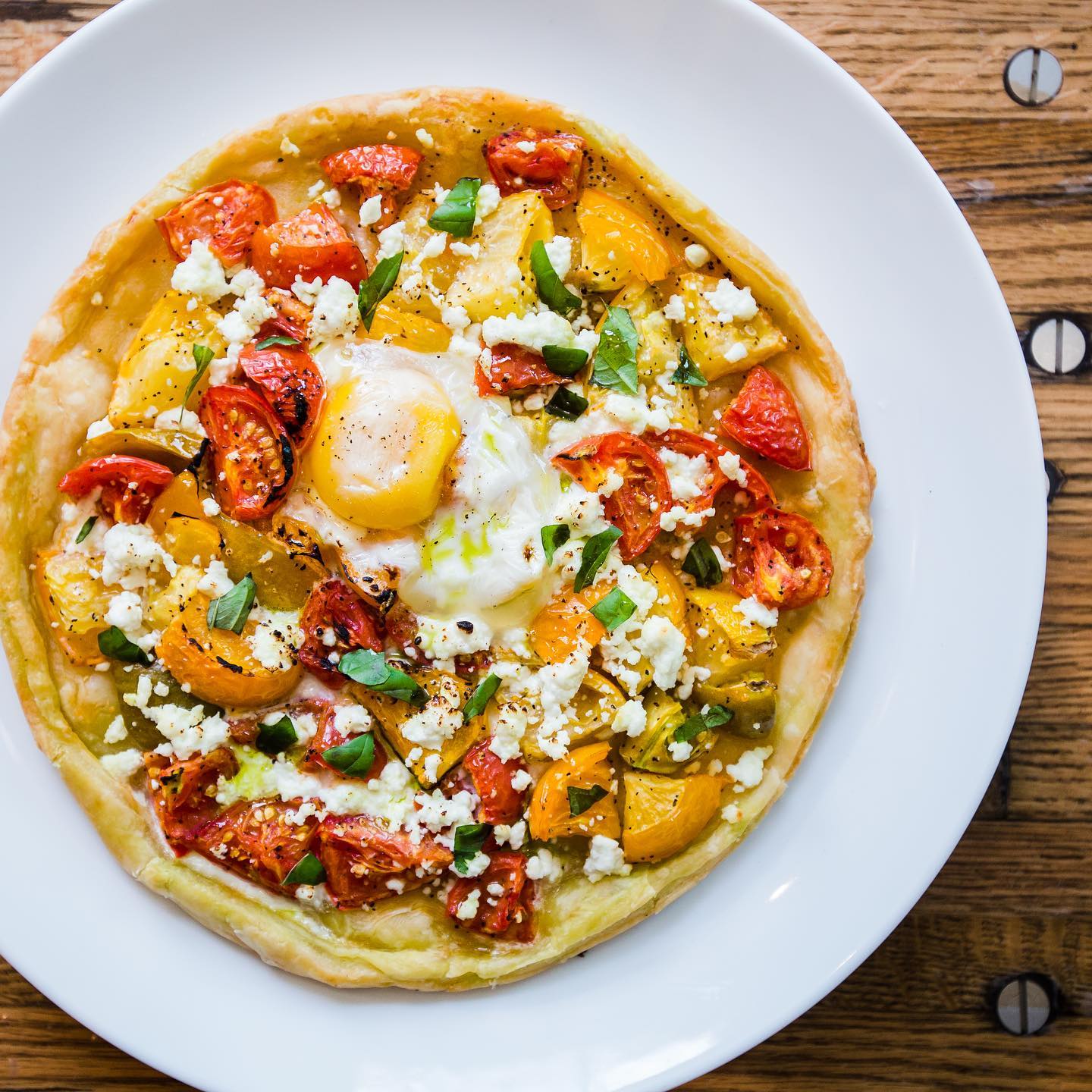 Order Heirloom Tomato Galette and Egg food online from Abouzy store, Houston on bringmethat.com