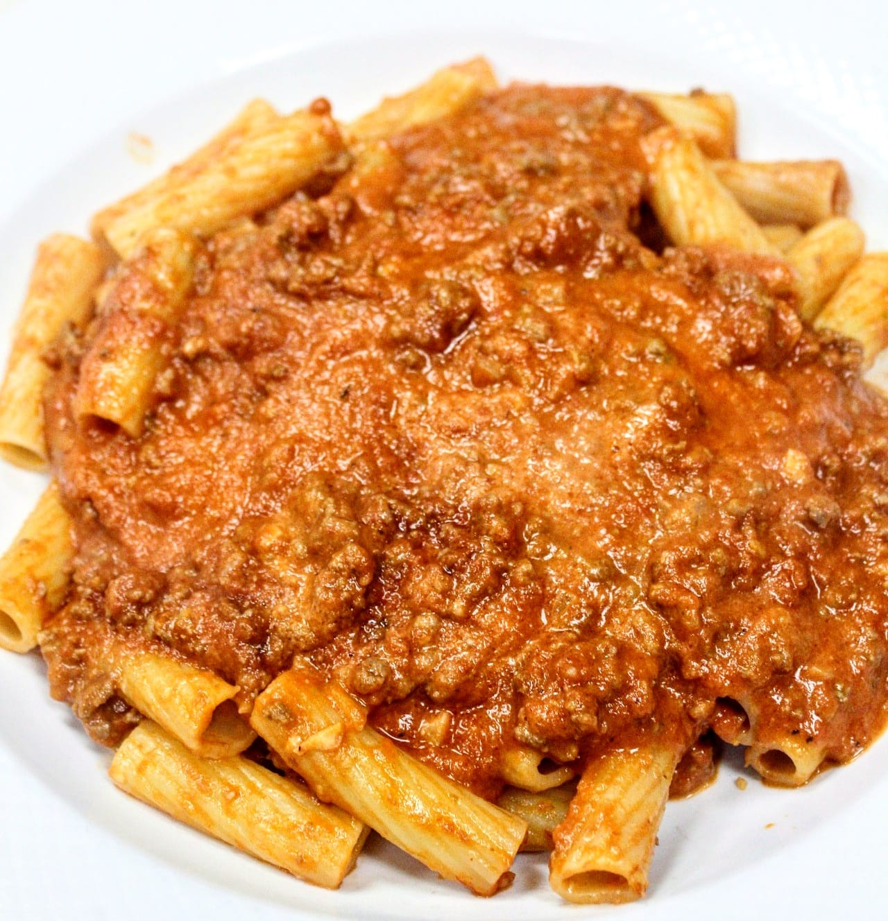 Order Bolognese Pasta Dish food online from Raimos Pizza Of Amityville store, Amityville on bringmethat.com