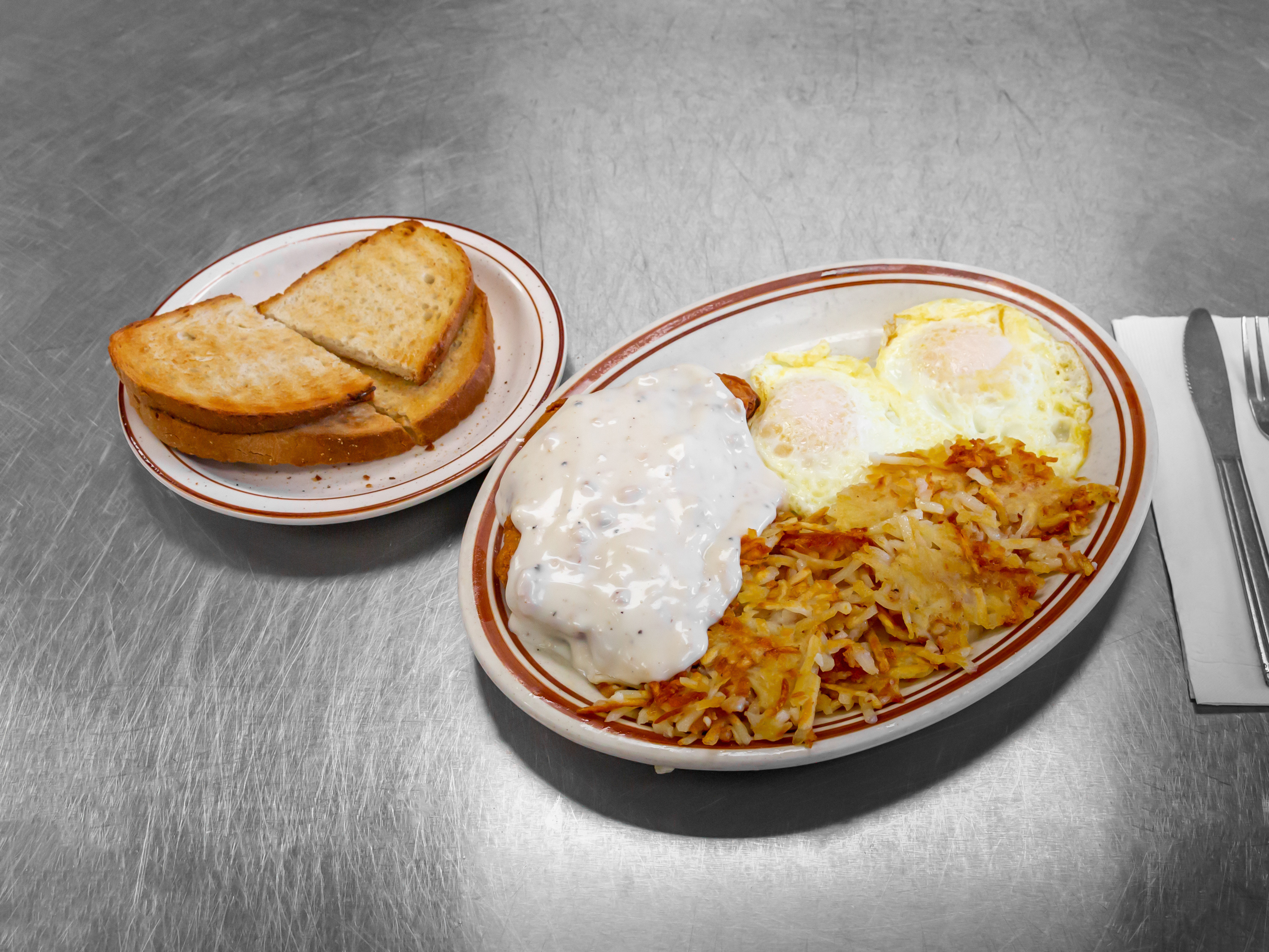 Order Country Fried Steak & 2 Eggs food online from Leda's Coney Island store, Livonia on bringmethat.com