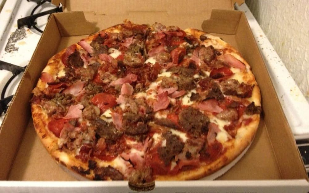 Order Meat Lovers Pizza - Medium 14" food online from Pino's Pizzeria store, Easton on bringmethat.com