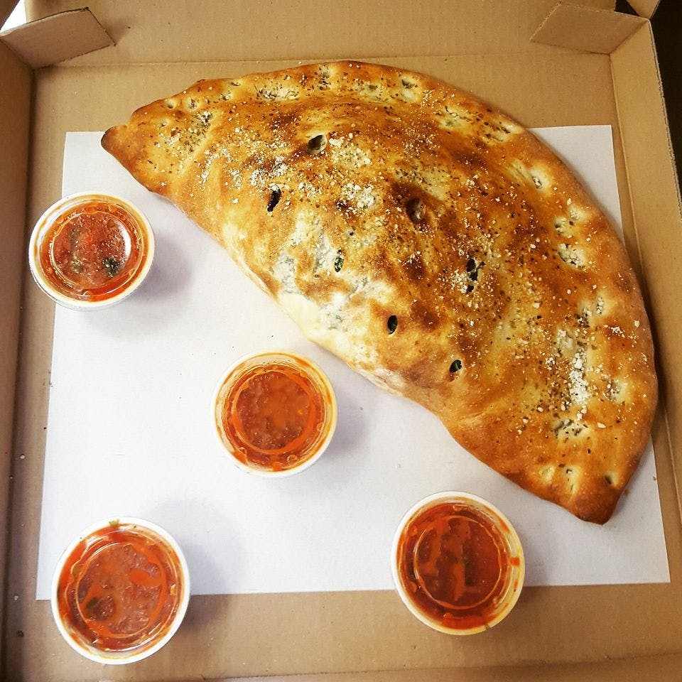 Order Calzone - Calzone food online from Pizza Mia store, Highland on bringmethat.com