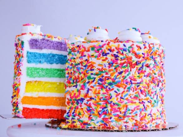 Order 6" Rainbow Cake food online from Carlos Bakery store, Hoboken on bringmethat.com