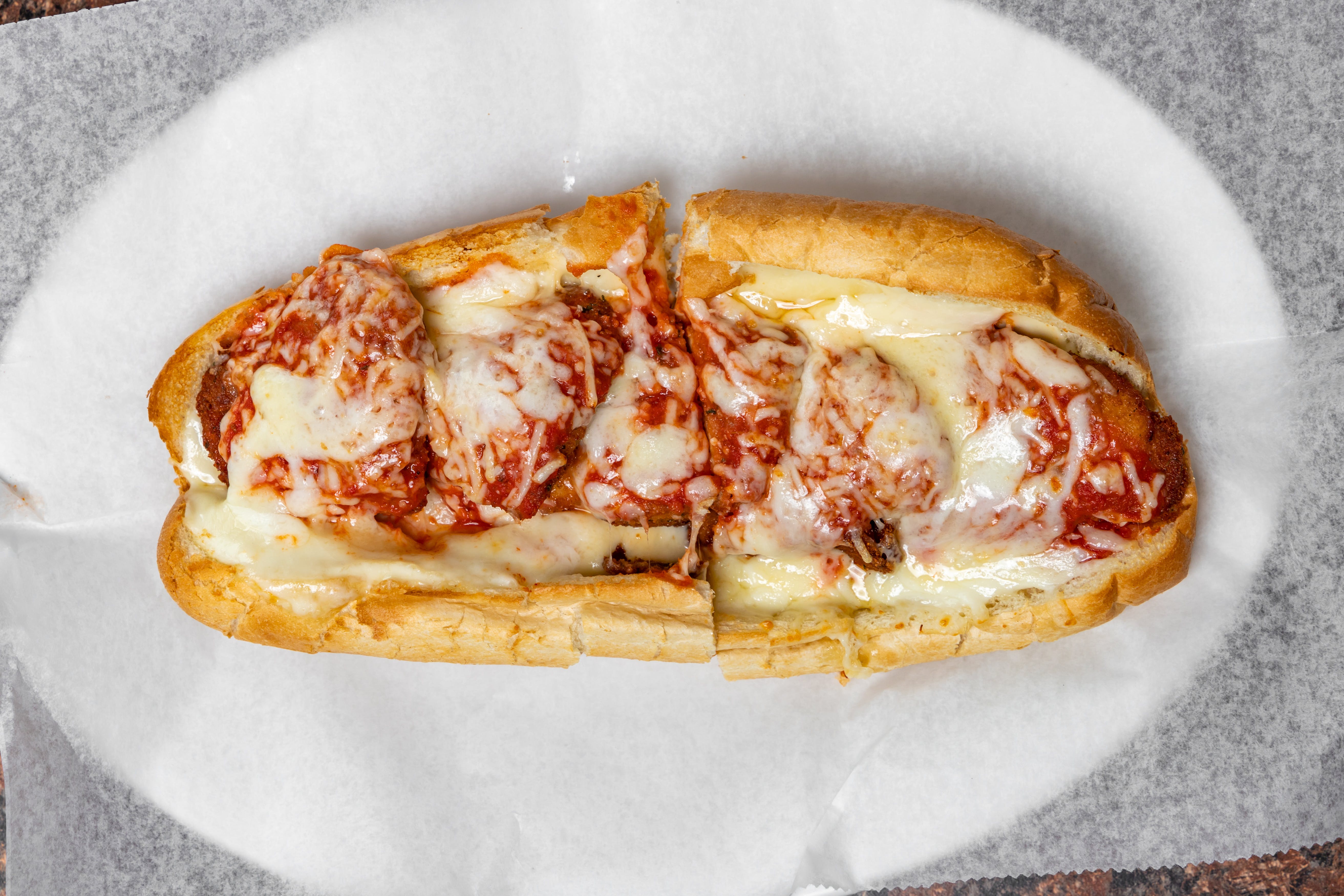 Order Chicken Parm Sub - Sub food online from Ellie's Pizza store, Beverly Farms on bringmethat.com