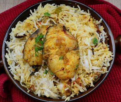 Order Exotic Fish Pulav food online from Peacock Indian Cuisine store, Plano on bringmethat.com