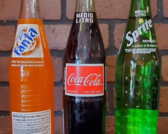 Order Mexican Coke food online from Gloria's Cafe store, Los Angeles on bringmethat.com