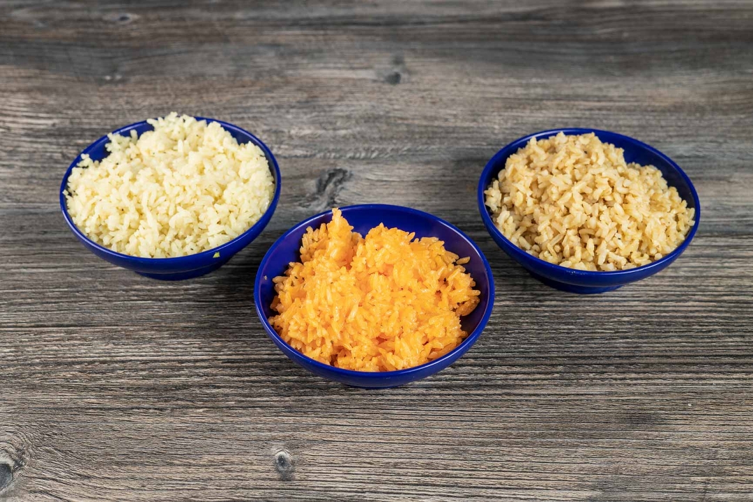 Order Yellow Rice food online from High Tide Taco Bar store, Farmingdale on bringmethat.com