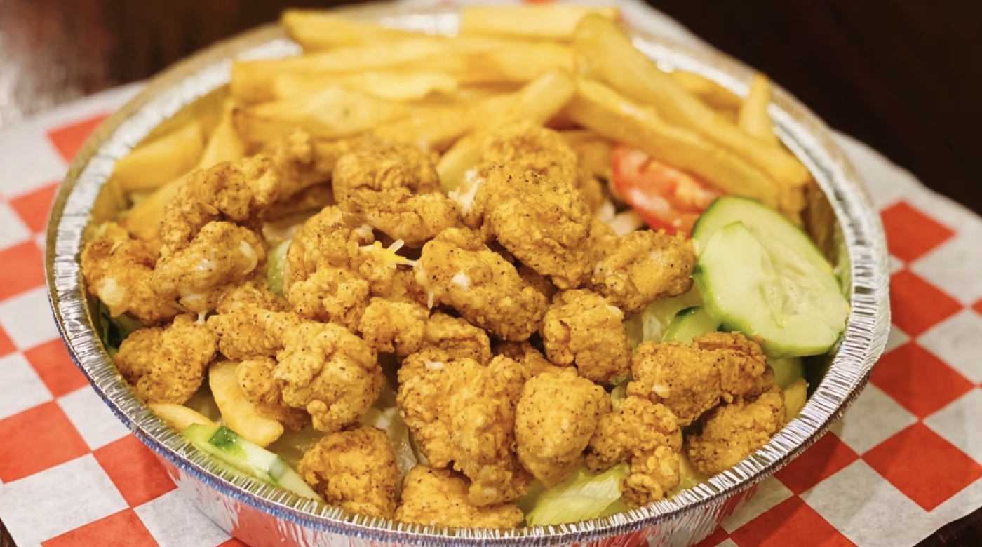 Order Popcorn Chicken Salad - Caesar food online from Chick-N Grille store, Pittsburgh on bringmethat.com