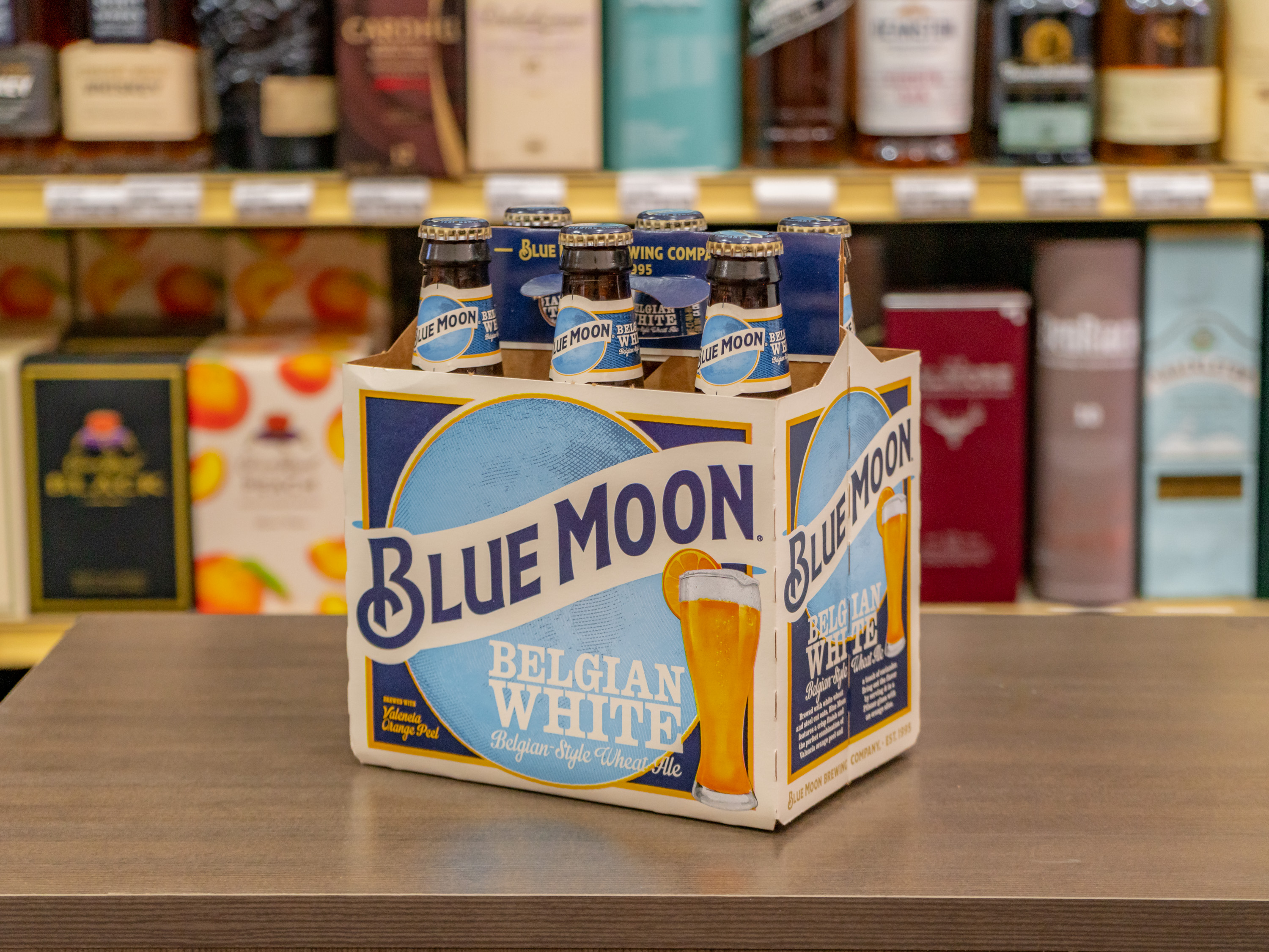 Order 6 Pack - 12 oz. Bottle of Blue Moon Beer (5.4% ABV) food online from Burlingame Liquor store, Burlingame on bringmethat.com